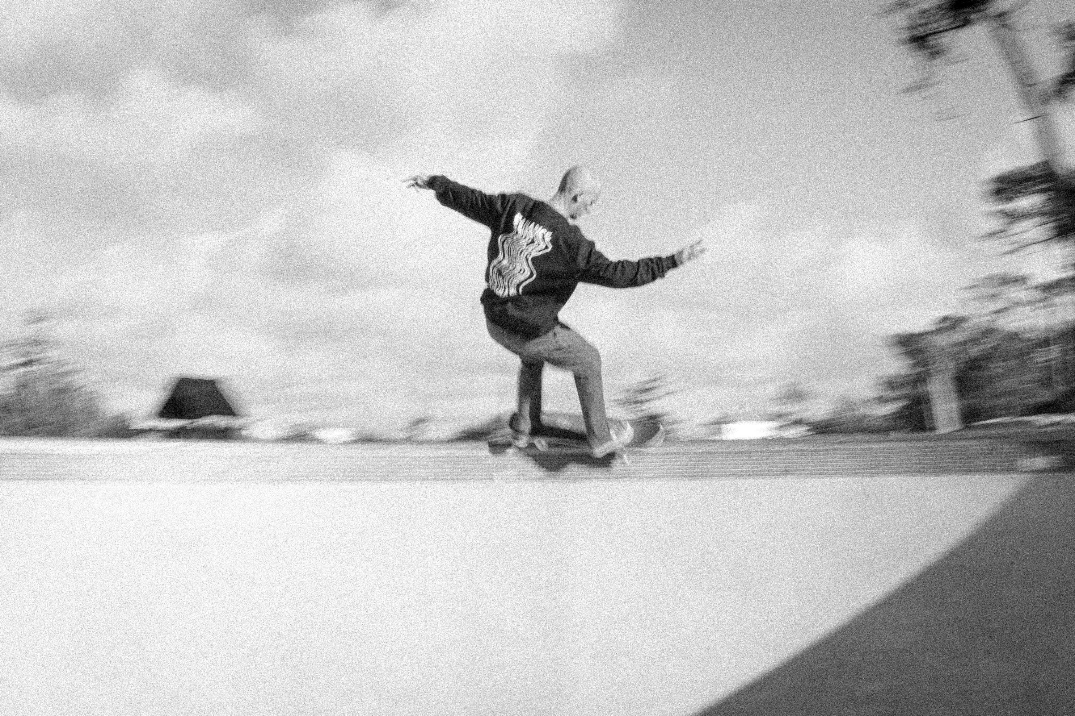 skater wearing radiance blurred crewneck 